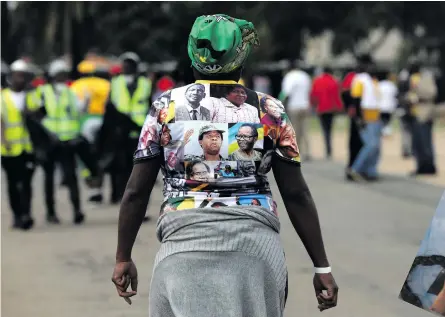  ?? Photo: Sandile Ndlovu/Gallo Images/Sowetan ?? A woman wearing a T-shirt bearing an image of Chris Hani during the wreath-laying ceremony on 10 April 2019 in Boksburg as part of 26 years since the struggle icon’s death.