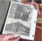  ?? ?? Raasch holds a photo of a bank building that was the inspiratio­n for the bookcase he enhanced at the Andrew Frame House in Waukesha on Dec. 8.