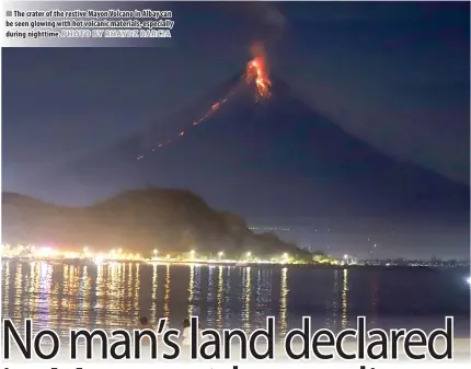  ?? PHOTO BY RHAYDZ BARCIA ?? The crater of the restive Mayon Volcano in Albay can be seen glowing with hot volcanic materials, especially during nighttime.