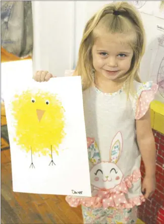  ?? Brodie Johnson • Times-Herald ?? Children are excited as Easter approaches, spending time dying eggs and drawing pictures to share with family members. Danee Capps, 4, shows off her Easter chick drawing at her local daycare.