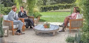  ?? PROVIDED BY JOE PUGLIESE/HARPO PRODUCTION­S ?? Prince Harry and Duchess Meghan of Sussex sat down with Oprah Winfrey in the backyard of their California home for a two-hour interview airing Sunday on CBS.