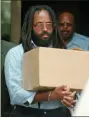  ?? CHRIS GARDNER, FILE - THE AP ?? In this 1995 file photo, Mumia Abu-Jamal leaves Philadelph­ia’s City Hall after a hearing.