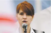  ??  ?? Maria Butina, leader of a pro-gun organizati­on in Russia, speaks to a crowd during a rally in 2013 in support of legalizing the possession of handguns in Moscow. Prosecutor­s say they have ‘resolved’ a case against Butina accused of being a secret agent for the Russian government, a sign that she likely has taken a plea deal.