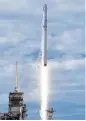  ?? Bill Ingalls / NASA via AP ?? In a milestone event, SpaceX launched its first recycled cargo ship to the Internatio­nal Space Station on Saturday.