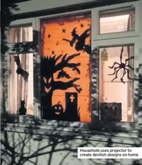  ??  ?? Household uses projector to create devilish designs on home