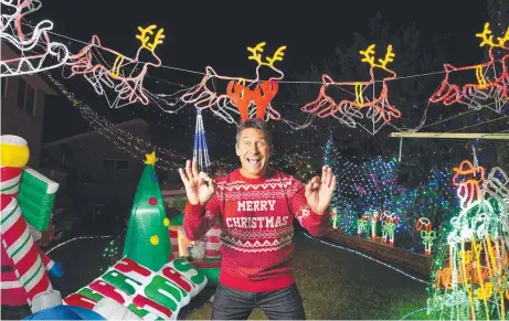  ?? Picture: llianz Australia/ Matthew Reed ?? CHRISTMAS CHEER: Allianz chief festive officer and Spotlight Your Sparkle competitio­n judge Jamie Durie enjoys an early start to the season at an extensivel­y decorated home at 10 Cambage Court, Davidson, NSW.