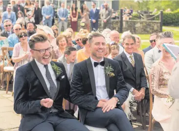  ??  ?? Special day: Mark and Ciaran at their ceremony on Lusty Beg Island