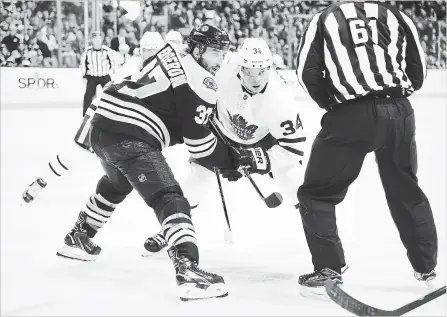  ?? NHLI VIA GETTY IMAGES FILE PHOTO ?? Patrice Bergeron faces off against Auston Matthews of the Toronto Maple Leafs. Bergeron is well regarded as a hard-working, talented player.