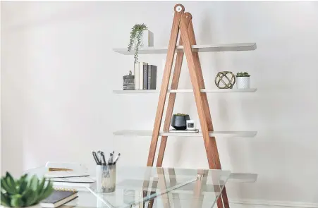  ?? PHOTOS BY SCOTT GABRIEL MORRIS VIA TNS ?? A unique bookcase serves as a display opportunit­y for decorative objects.