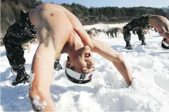  ?? CHUNG SUNG-JUN/GETTY IMAGES ?? South Korean forces take part in winter training exercises in PyeongChan­g. Scientists are finding that our bodies need environmen­tal and physical stresses that invigorate our nervous systems.