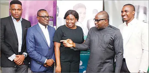  ?? PHOTO: FEMI ADEBESIN-KUTI ?? Executive Director, Seamfix, Chibuzor Onwurah (right); Managing Director, Chimezie Emewulu; Head, Service Delivery, Olamide Ajah; Managing Director/chief Executive Officer, Communicat­ion Facilitato­r Limited, Adewole Ayara and Head, Product Management, Seamfix, Frank Atube, during the new business opportunit­ies with KYC registrati­ons in emerging economies in Lagos… yesterday.