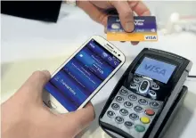  ?? THE ASSOCIATED PRESS FILES ?? Visa is looking to push more small businesses into updating their digital payment technology, offering up to $10,000 to 50 U.S.-based small business owners that are committed to going cashless.