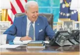  ?? ADAM SCHULTZ/THE WHITE HOUSE/AFP VIA GETTY IMAGES ?? President Joe Biden talks on the phone with French President Emmanuel Macron on Wednesday.