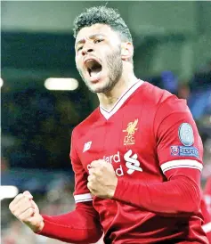  ??  ?? Liverpool’s Oxlade-Chamberlai­n celebrates scoring the second goal during the Champions League quarter final first Leg match against Manchester City at Anfield in Liverpool, Britain in this April 4 file photo. — Reuters photo