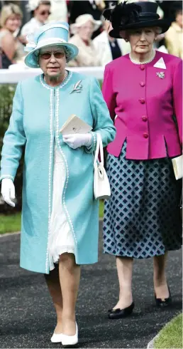  ?? ?? Unwavering devotion: The late Queen attending Royal Ascot with one of her ladies-in-waiting, Mary Morrison