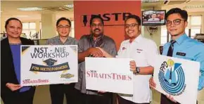  ?? ZAIN AHMED
PIC BY ?? (From left) Grand BlueWave Hotel advertisin­g/promotion and administra­tion assistant manager Sutha Menon, Grand BlueWave Hotel general manager Long Cheow Siong, Johor English Language Teaching Associatio­n president Vincent D’Silva, Johor NST bureau...