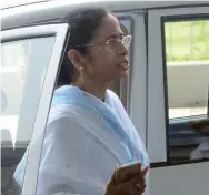  ?? — ASIAN AGE ?? CM Mamata Banerjee at Kolkata airport on her way to the Indo- Nepal Border Zero Point, near Siliguri, on Monday. Ms Banerjee said, “West Bengal government has sent 30 trucks with food, water, tarpaulins and other relief material to Nepal. There is...