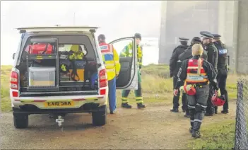  ??  ?? Emergency services search river Medway around the M2 motorway bridge