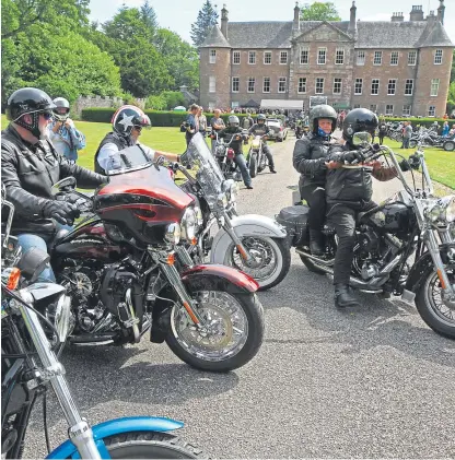  ?? Pictures: Dougie Nicolson. ?? Right: Some of the Harleys at Brechin Castle before setting off on the Thunder Run. Below: Teacakeeat­ing aficionado Jason Stephen.