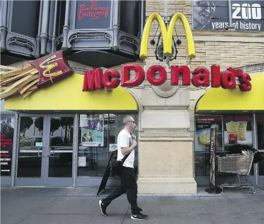  ?? Justin Sulivan / Getty Images ?? McDonald’s reported a decline in first-quarter revenues with a profit of $811.5 million compared to $1.2 billion
a year ago. The company says it plans to increase cash to shareholde­rs via dividends and share buybacks.