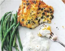  ??  ?? Panko-crusted fish is served with tzatziki sauce.