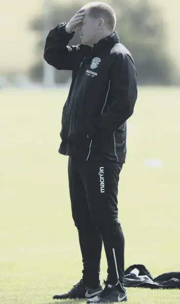  ??  ?? 0 Hibs manager Neil Lennon seems to have plenty on his mind at the club’s Tranent training ground.