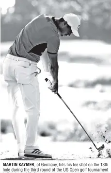  ?? AP PHOTO ?? MARTIN KAYMER, of Germany, hits his tee shot on the 13th hole during the third round of the US Open golf tournament in Pinehurst, NC, Saturday.