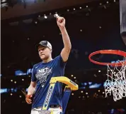  ?? Maddie Meyer/Getty Images ?? UConn’s Cam Spencer celebrates after defeating Illinois in the Elite 8 round of the NCAA Tournament at TD Garden on Saturday.