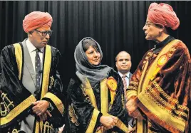  ?? NITIN KANOTRA /HT ?? (From left) J&K governor NN Vohra, chief minister Mehbooba Mufti and Union finance minister Arun Jaitley at the 17th convocatio­n of University of Jammu on Sunday.