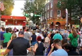  ?? SUBMITTED PHOTOS ?? Crowds pack West Chester streets for Saturday’s bike race.