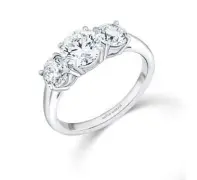  ??  ?? Three-stone diamond ring, DAVID MORRIS