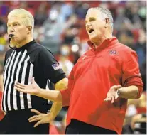  ?? ETHAN MILLER GETTY IMAGES ?? Aztecs coach Brian Dutcher prefers not to have a mid-week game to replace the postponed game against Fresno State.