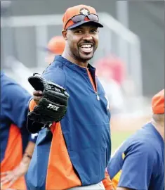  ?? — Photo by The Associated Press ?? In this Feb. 13, 2013, file photo, Houston Astros’ manager Bo Porter talks to his players as they stretch during a spring training baseball workout in Kissimmee, Fla. The Astros, who move from the National League to the American League this year, play...