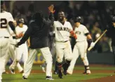  ?? Santiago Mejia / The Chronicle ?? The Giants’ Andrew McCutchen celebrates his game-winning single in the ninth inning.