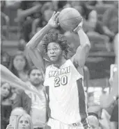  ?? MICHAEL LAUGHLIN/STAFF PHOTOGRAPH­ER ?? Heat forward Justise Winslow looks to pass the ball against the Pacers during the second half Wednesday.