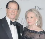  ?? PASCAL LE SEGRETAIN / GETTY IMAGES FOR PRINCESS GRACE FOUNDATION ?? Sir Roger Moore and his wife Kristina Tholstrup attend the 2015 Princess Grace Awards Gala at Monaco Palace in Monte Carlo, Monaco.