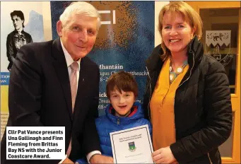  ??  ?? Cllr Pat Vance presents Una Gallinagh and Finn Fleming from Brittas Bay NS with the Junior Coastcare Award.