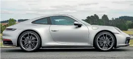  ?? PHOTOS: DAMIEN O’CARROLL/STUFF ?? The 911 Carrera still has an iconic and immediatel­y recognisab­le shape.