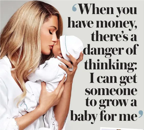  ?? ?? Baby love: Paris Hilton with newborn Phoenix, who was born to a surrogate (not Shanna St Clair)