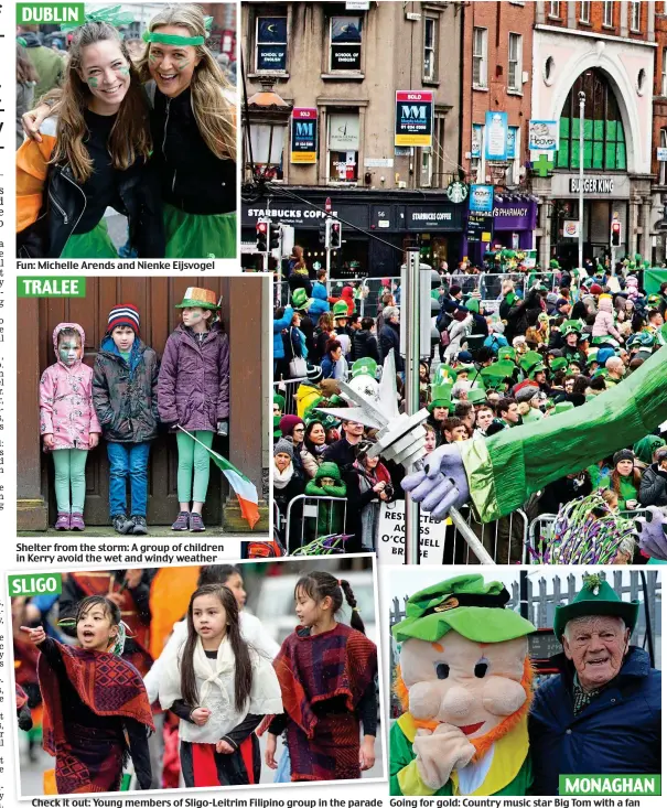  ??  ?? Shelter from the storm: A group of children in Kerry avoid the wet and windy weather Check it out: Young members of Sligo-Leitrim Filipino group in the parade Going for gold: Country music star Big Tom with a fan TRALEE SLIGO MONAGHAN