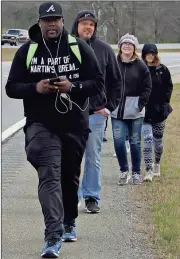  ?? Kevin Myrick / SJ ?? Terence Lester of Love Beyond Walls, an Atlanta nonprofit serving the homeless, is walking to Memphis to commemorat­e the 50th anniversar­y of the death of Dr. Martin Luther King Jr.