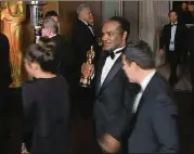  ?? JEFF TURNER/ASSOCIATED PRESS ?? This still image from AP video appears to show the man who authoritie­s say stole Frances McDormand’s best actress Oscar walking out of the official Academy Awards after-party in Los Angeles.