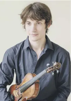  ??  ?? 0 Ryan Young plays with grace and power, remaining true to Scots fiddle tradition