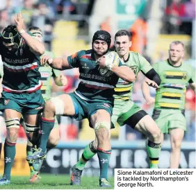  ??  ?? Sione Kalamafoni of Leicester is tackled by Northampto­n’s George North.