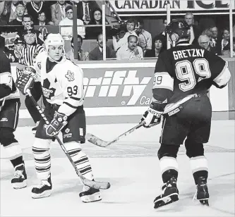  ?? GRAIG ABEL GETTY IMAGES ?? Wayne Gretzky skates by Doug Gilmour of the Toronto Maple Leafs in that fateful 1993 Stanley Cup semifinal.