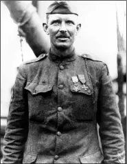  ?? (Courtesy Photo/Department of the Army) ?? Army Sgt. Alvin York in 1919 in an unknown location. The claim in Pennsylvan­ia state Sen. Doug Mastriano’s 2014 book about York, that a 1918 U.S. Army Signal Corps photo was mislabeled and actually shows York with three German officers he captured, has been disputed by rival researcher­s.