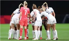  ?? Photograph: Masashi Hara/Getty Images ?? Team GB go into a huddle before beating Japan. ‘We build connection­s every day on and off the pitch,’ said Rachel Daly.