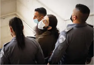  ?? (Yonatan Sindel/Flash90) ?? WASIM A-SAYED arrives at Jerusalem District Court yesterday for a hearing on the murder of the Kaduri couple in January 2019 and of Ivan Tarnovski in January 2022.