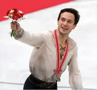  ?? (Reuters) ?? ISRAEL’S ALEXEI BYCHENKO celebrates after winning the bronze medal at the Japan grand prix yesterday in Osaka.