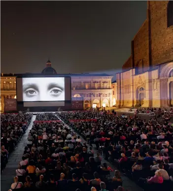  ?? PHOTOGRAPH: LORENZO BURLANDO / COURTESY OF FONDAZIONE CINETECA DI BOLOGNA ?? Cinema Sotto le Stelle, Piazza Maggiore, in Bologna, in 2018: “Storytelli­ng is really about a relationsh­ip,” architect and set designer David Rockwell notes in his new book Drama (Phaidon, £39.95). “If there’s nobody’s listening to the story, there is no relationsh­ip.” Drama looks at how architectu­re and theatrical spaces intersect and examines Rockwell’s own stage designs, including his designs for bars, restaurant­s and theatres